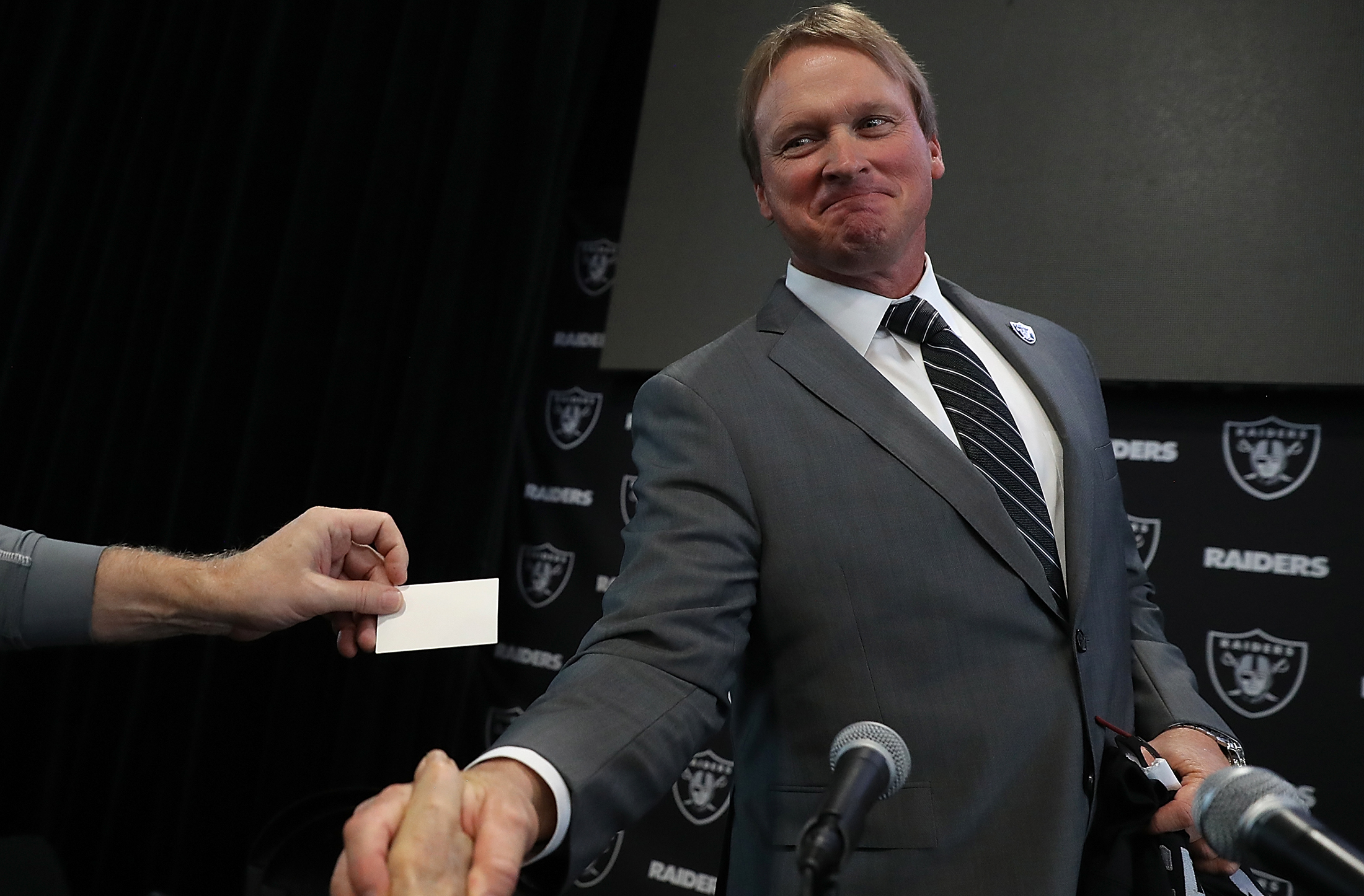 Raiders reach undisclosed contract settlement with Jon Gruden just