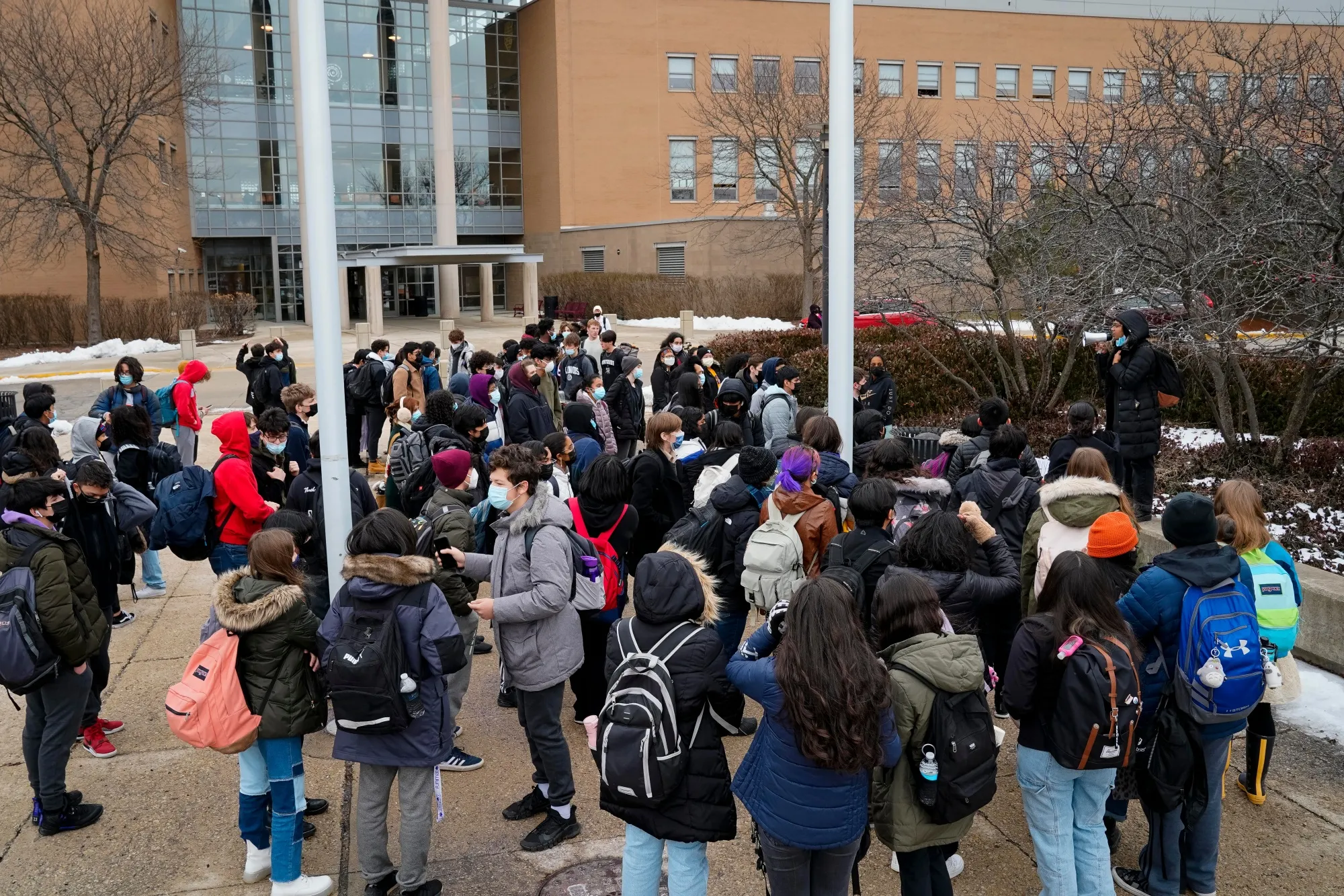 High school students gather outside during a walkout over Covid-19 safety measures at Chicago Public Schools in Chicago, Illinois, on Jan. 14.