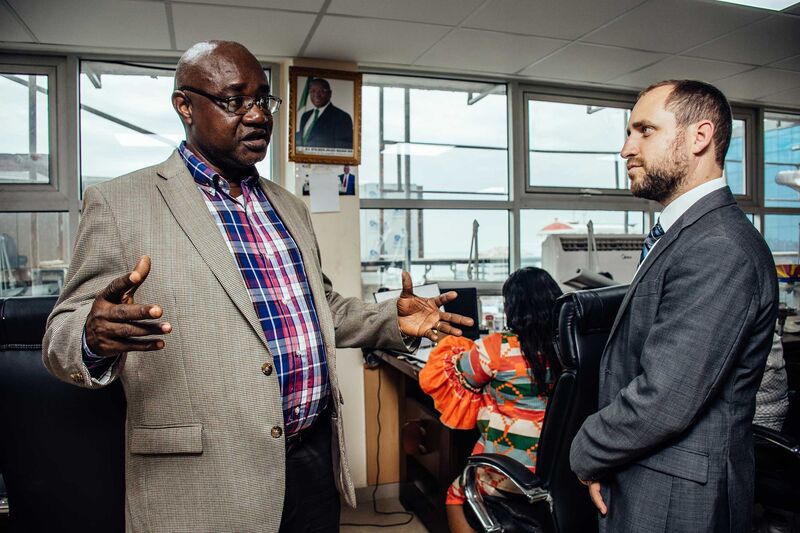 Samuel Nkoroma, Deputy director Solid Minerals takes Ezi Rapaport and team on a tour of the National Minerals Agency (NMA) in Freetown.