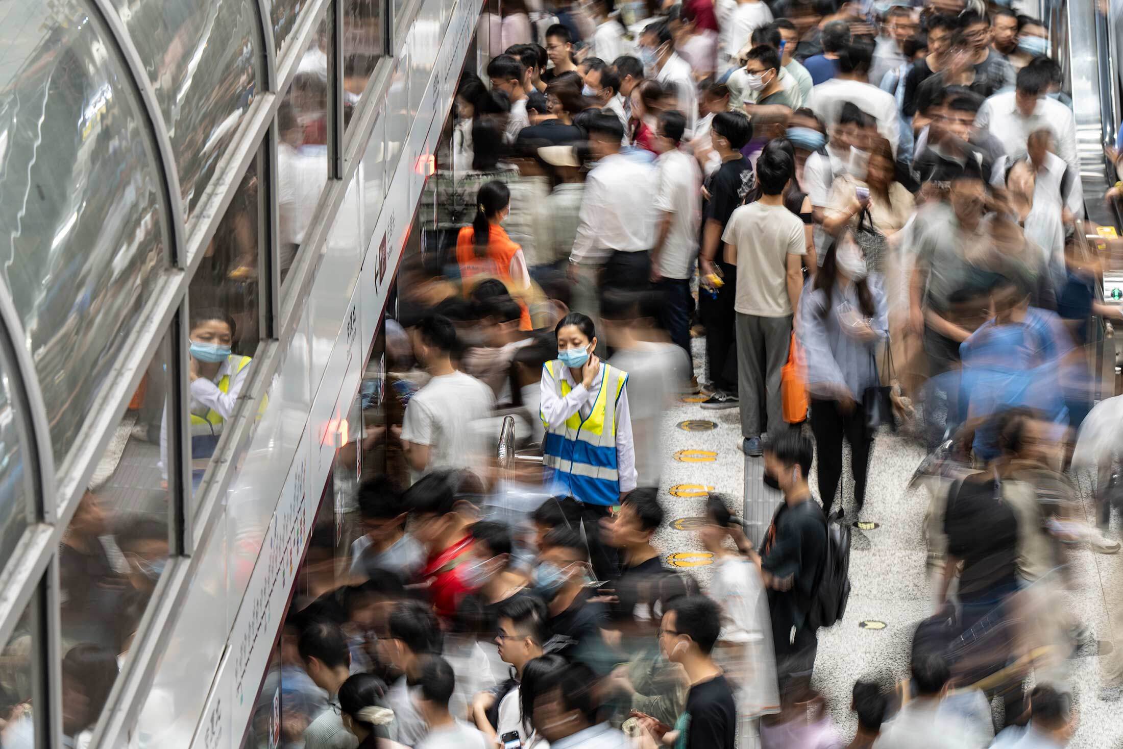 Morning commuters at the Gangxiabei metro station in Shenzhen last month.