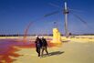 Workers Walk in Sulfur Pit