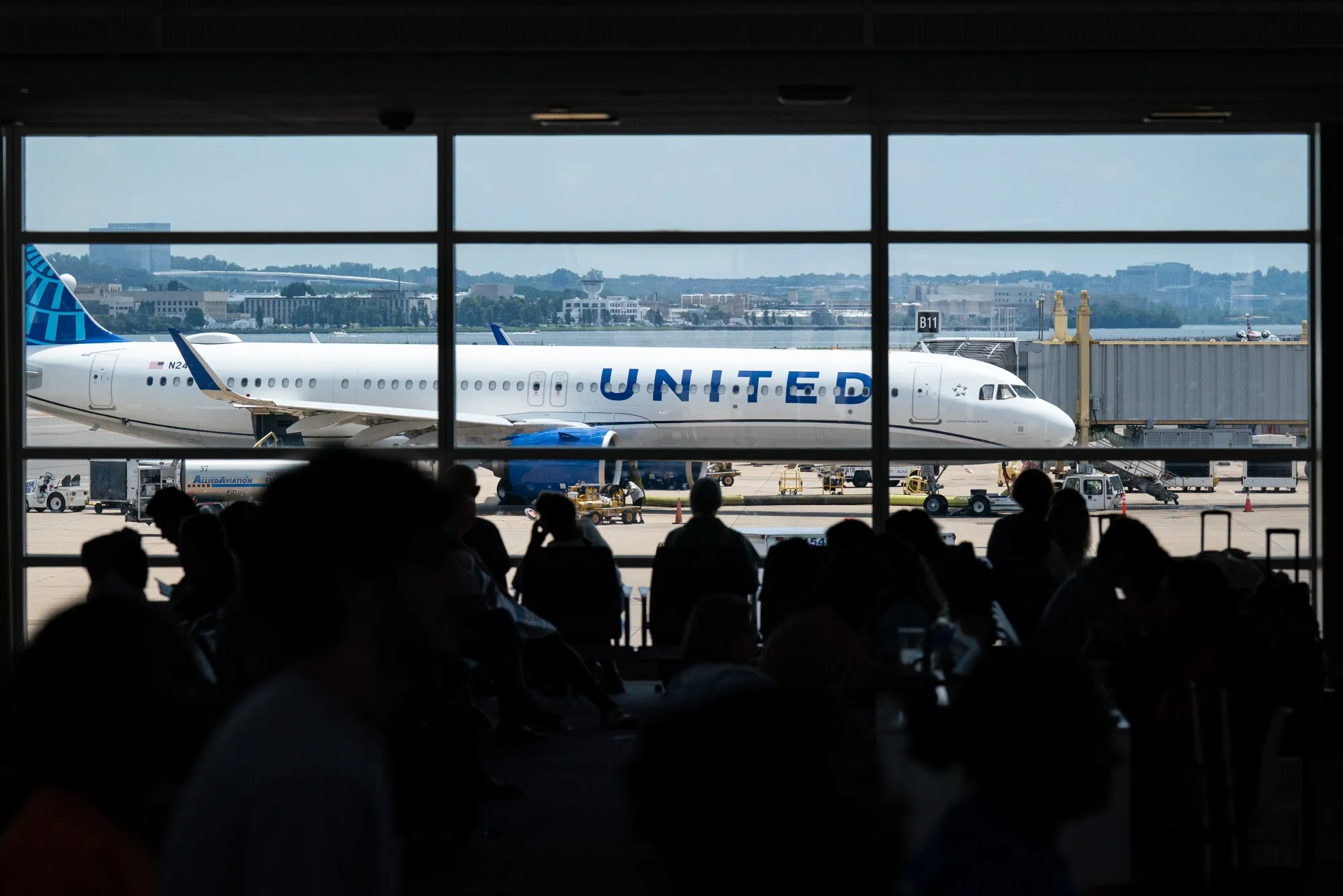 A United Airlines Holdings plane on the tarmac at Ronald Reagan Washington National Airport in Arlington, Virginia.
