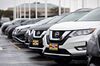 A 2019 Nissan Motor Co. Rogue sport utility vehicle (SUV) sits on the lot at a car dealership in Joliet, Illinois, U.S., on Wednesday, Oct. 2, 2019. Auto sales in the U.S. probably took a big step back in September, setting the stage for hefty incentive spending by carmakers struggling to clear old models from dealers' inventory.