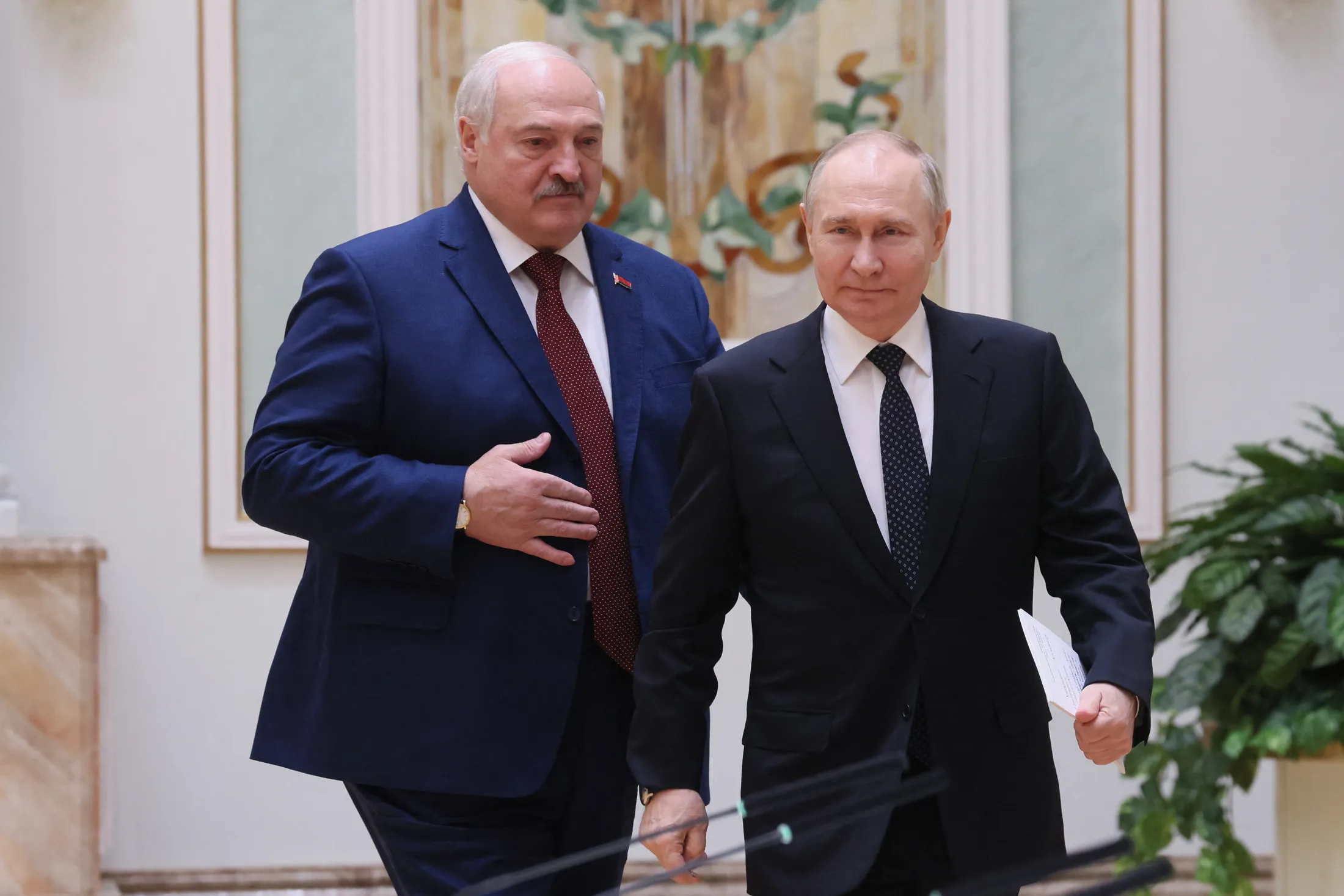 Belarusian President Alexander Lukashenko, left, and Vladimir Putin, in a photo released by Russian state media.
