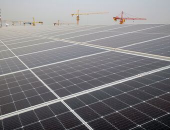 relates to China Solar Firms Halt Output in Southeast Asia on US Curbs
