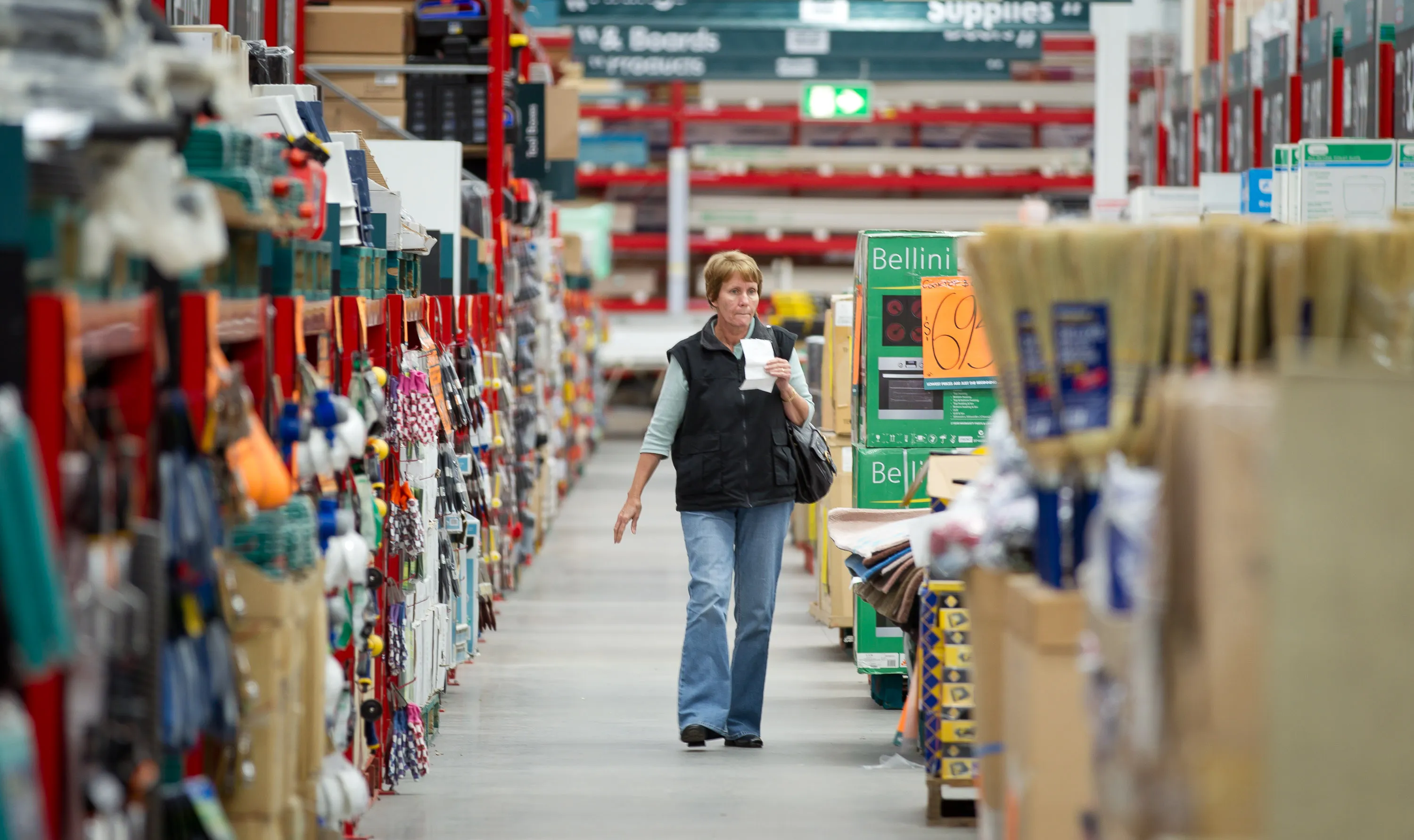 A shopper walks through the aisles of a Wesfarmers Ltd. Bunnings Warehouse store in Sydney, Australia, on Thursday, July 28, 2011.&nbsp;