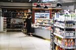 A customer at a supermarket in Metro Manila in July. 