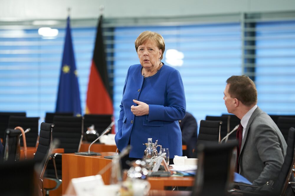 Merkel Urges Unity In Biggest Challenge Since World War Ii Bloomberg