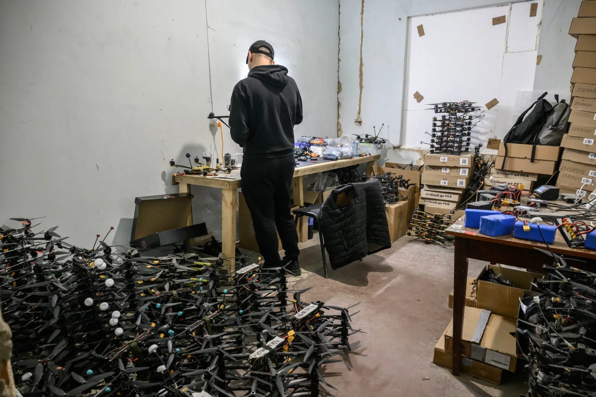 A technician works on drones at an undisclosed location in Ukraine on Oct. 7.