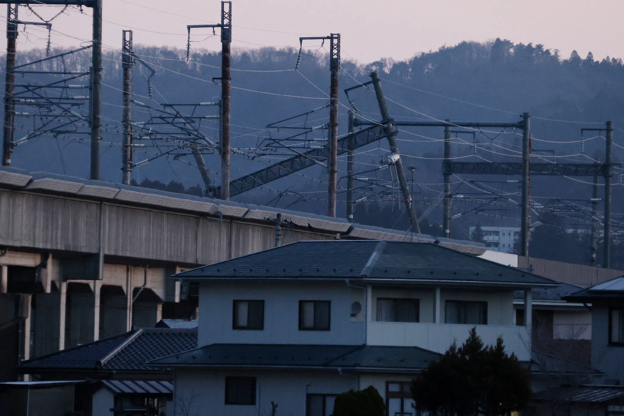 Damaged bullet train wire pillar in Miyagi prefecture on March 17.