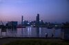 Buildings in Kowloon are seen across the Victoria Harbor from the Causeway Bay district at dusk in Hong Kong, China, on Sunday, Nov. 3, 2019. The record weakness facing Hong Kong's hard-hit retailers continued, albeit at a slower pace, in September as violent protests helped push the city into a recession, data released on Nov. 1 showed.