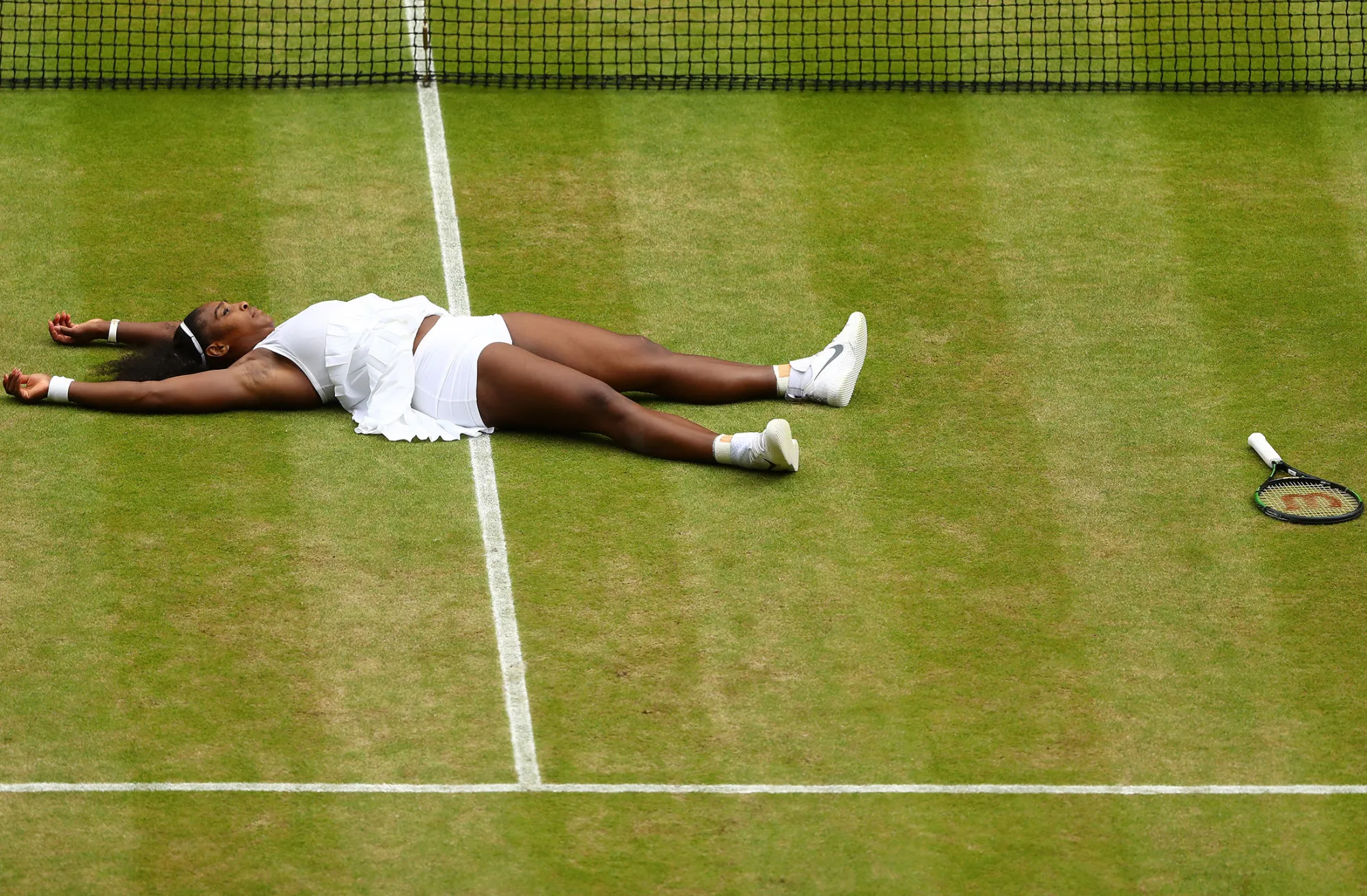 LONDON, ENGLAND - JULY 09: Serena Williams of The United States celebrates victory following The Ladies Singles Final against Angelique Kerber of Germany on day twelve of the Wimbledon Lawn Tennis Championships at the All England Lawn Tennis and Croquet Club on July 9, 2016 in London, England.
