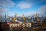Storage silos and shipping cranes at the Port of Odesa.