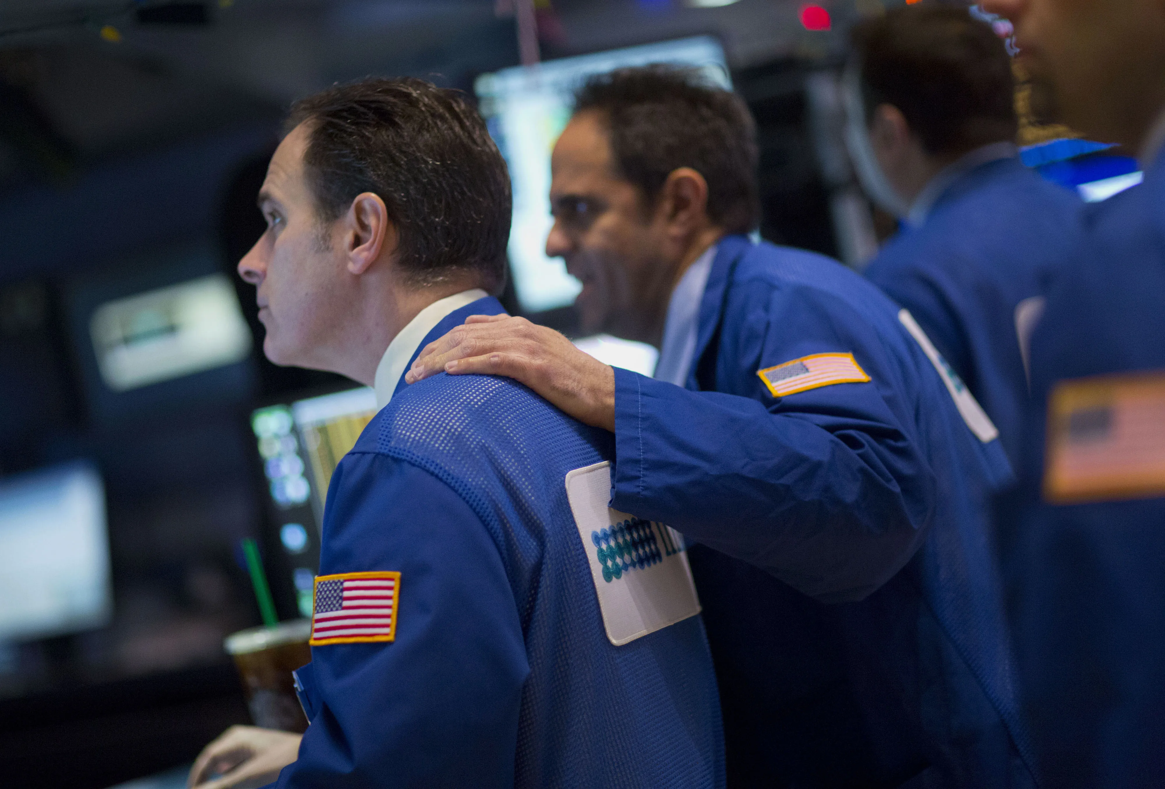 Traders work on the floor of the New York Stock Exchange (NYSE).
