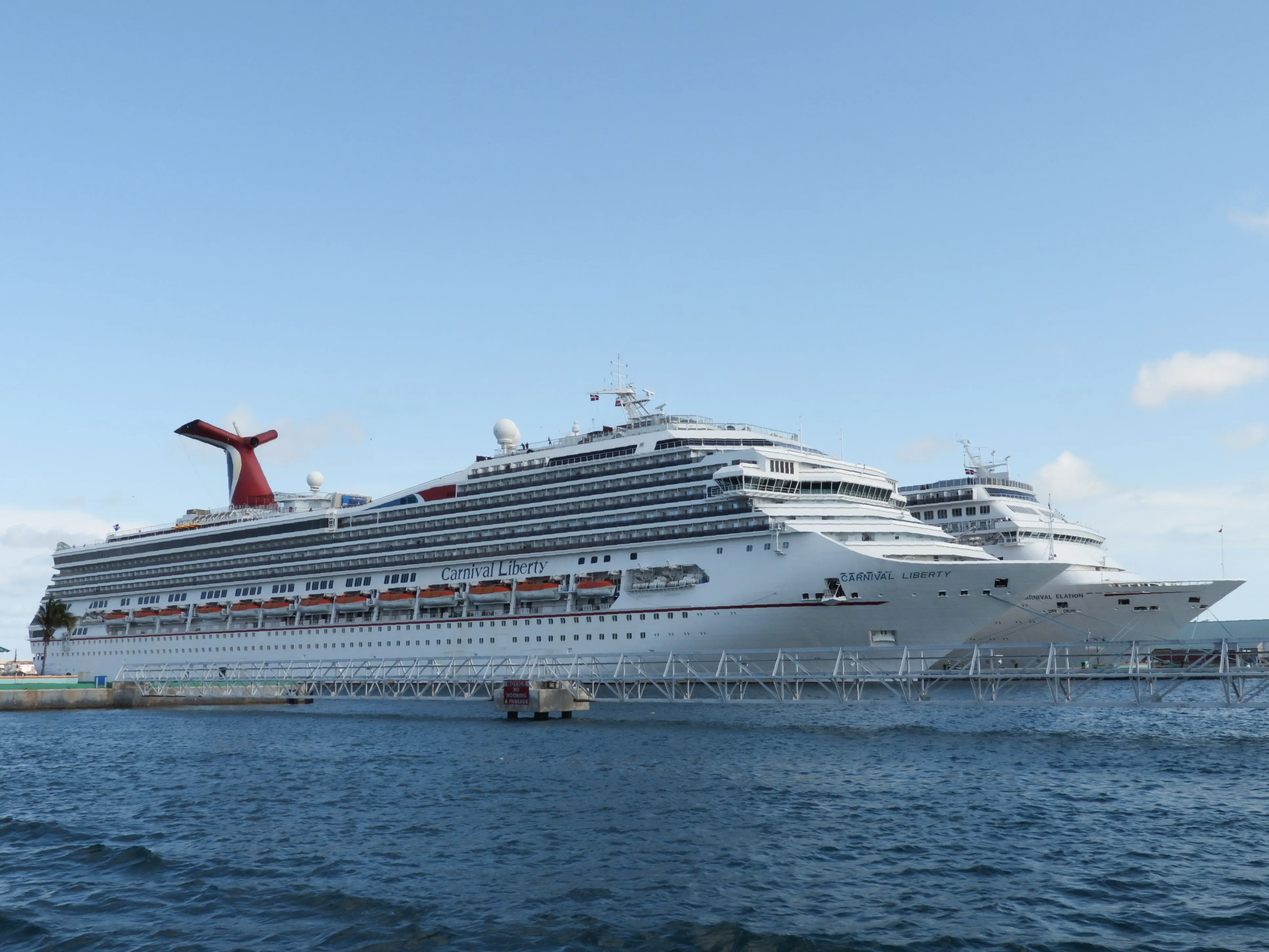 Ships from the Carnival cruise line are seen in Nassau, Bahamas on April 29, 2019. (Photo by Daniel SLIM / AFP) (Photo credit should read DANIEL SLIM/AFP via Getty Images)