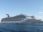 Ships from the Carnival cruise line are seen in Nassau, Bahamas on April 29, 2019. (Photo by Daniel SLIM / AFP) (Photo credit should read DANIEL SLIM/AFP via Getty Images)