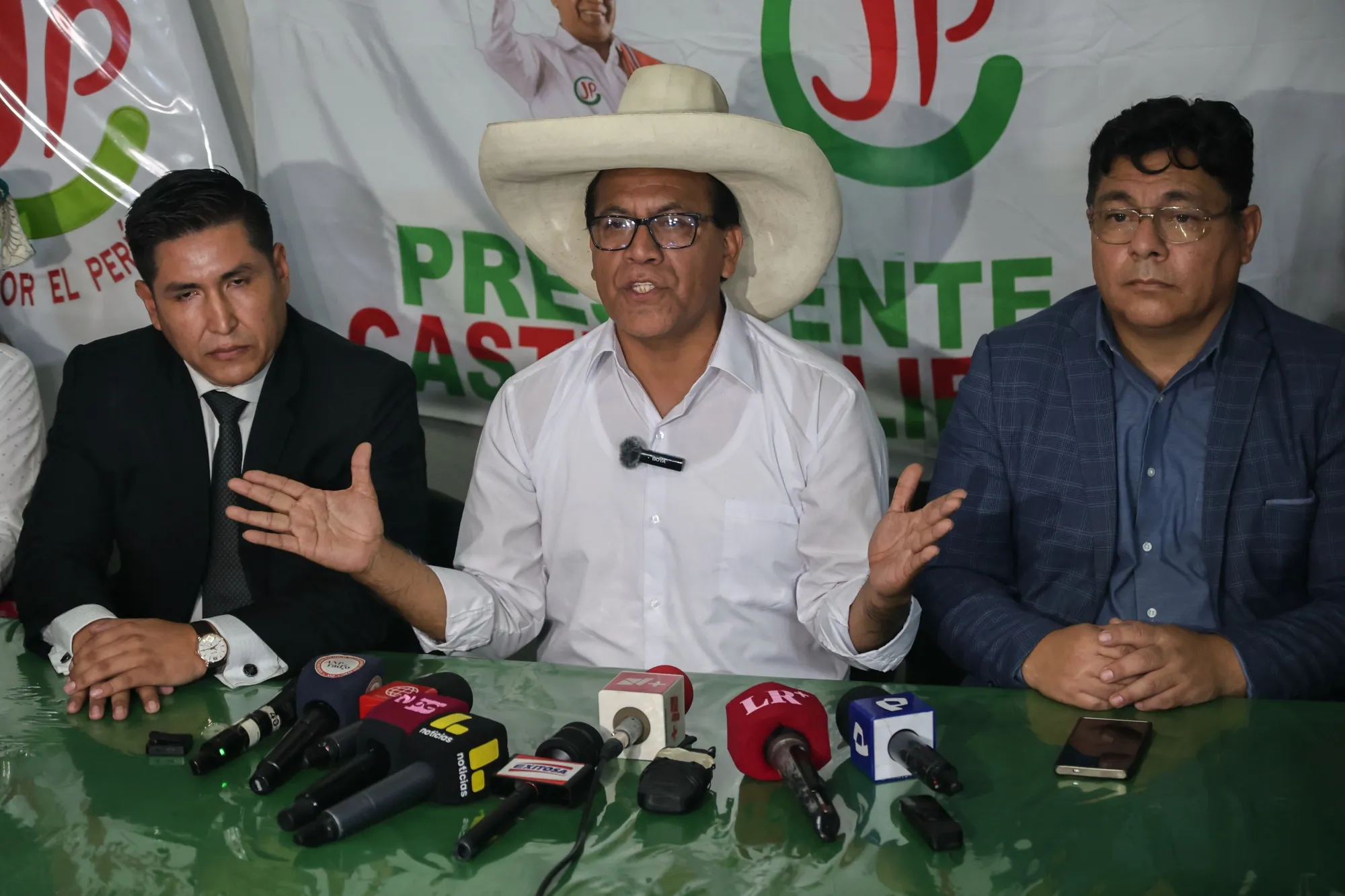 Roberto Sánchez, center, speaks during a news conference at the Together for Peru party headquarters in Lima&nbsp;on&nbsp;April 14.