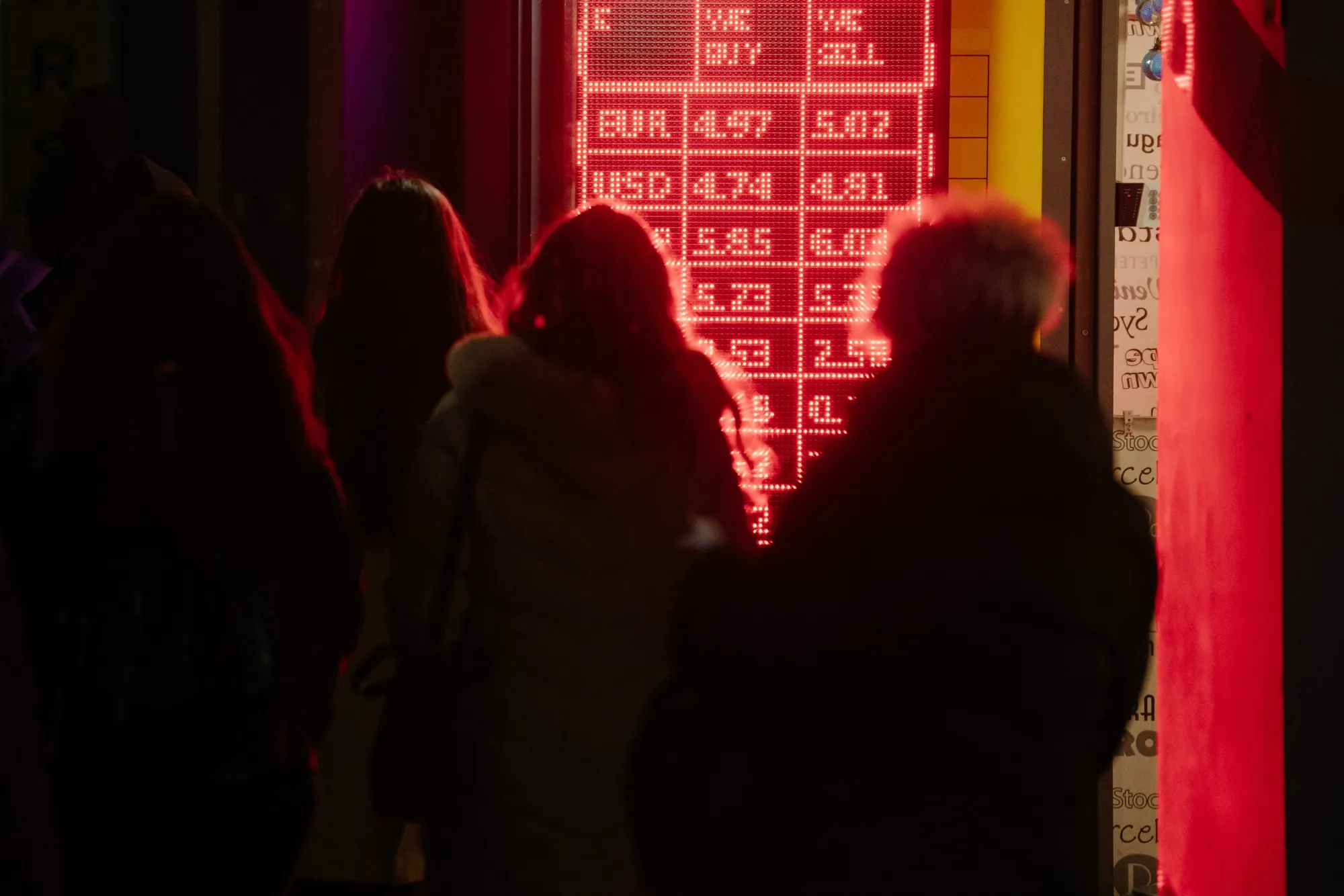 A screen showing currency prices in Bucharest, Romania.