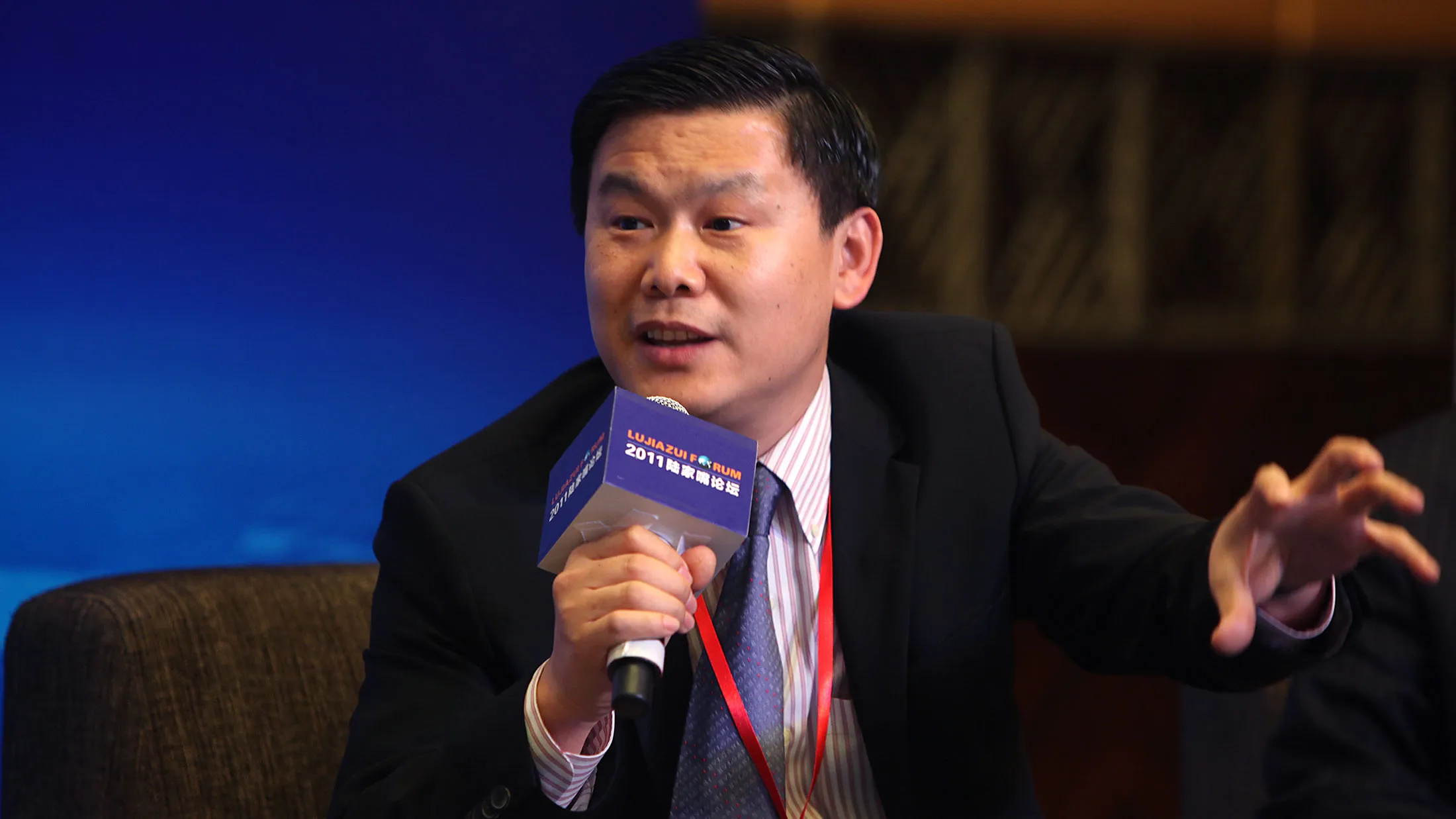 Guotai Junan International Shares Surge After Chairman Returns - Bloomberg