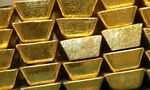 A pile of 40 Troy oz High Fine Gold Bars is shown in a subcompartment of the vault inside of The United States Mint Tuesday June 20,2006 in West Point, New York. Daniel Barry/Blooomberg News
