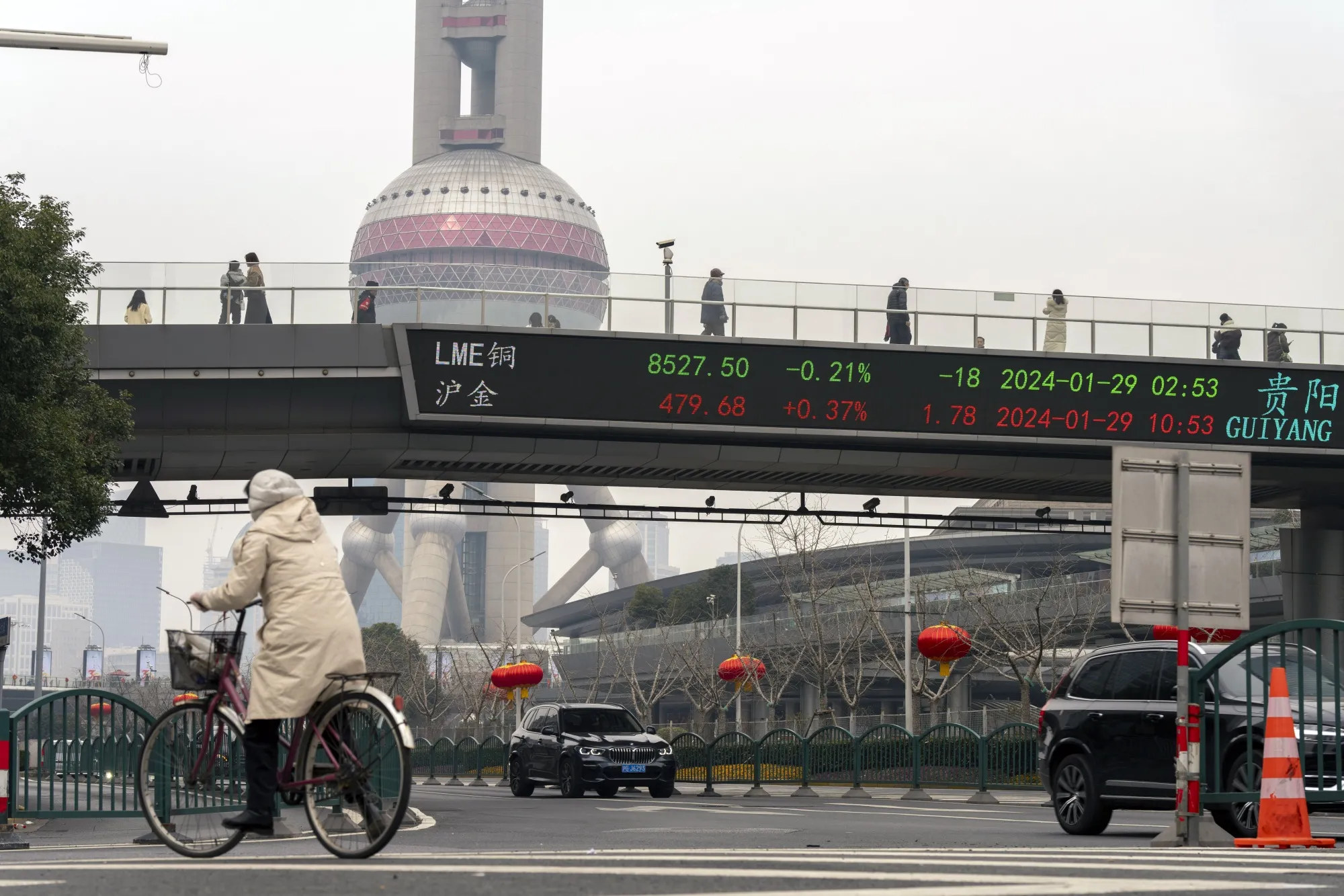 Stock figures in Pudong's Lujiazui Financial District in Shanghai.