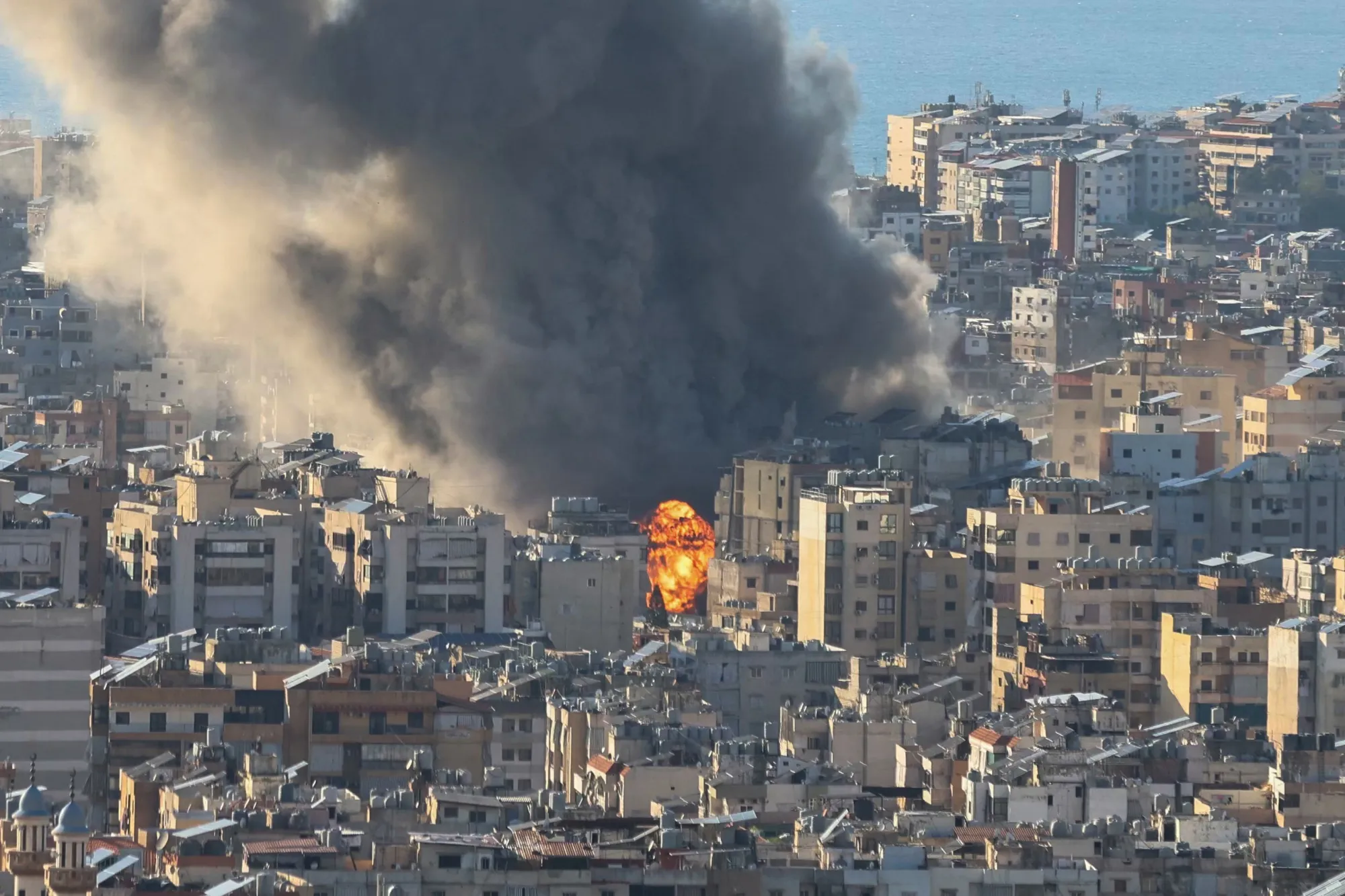 Smoke plumes billow following Israeli bombardment on Beirut's southern suburbs on March 2.