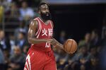 James Harden of Houston Rockets drives the ball during the game between Houston Rockets and New Orleans Pelicans.
