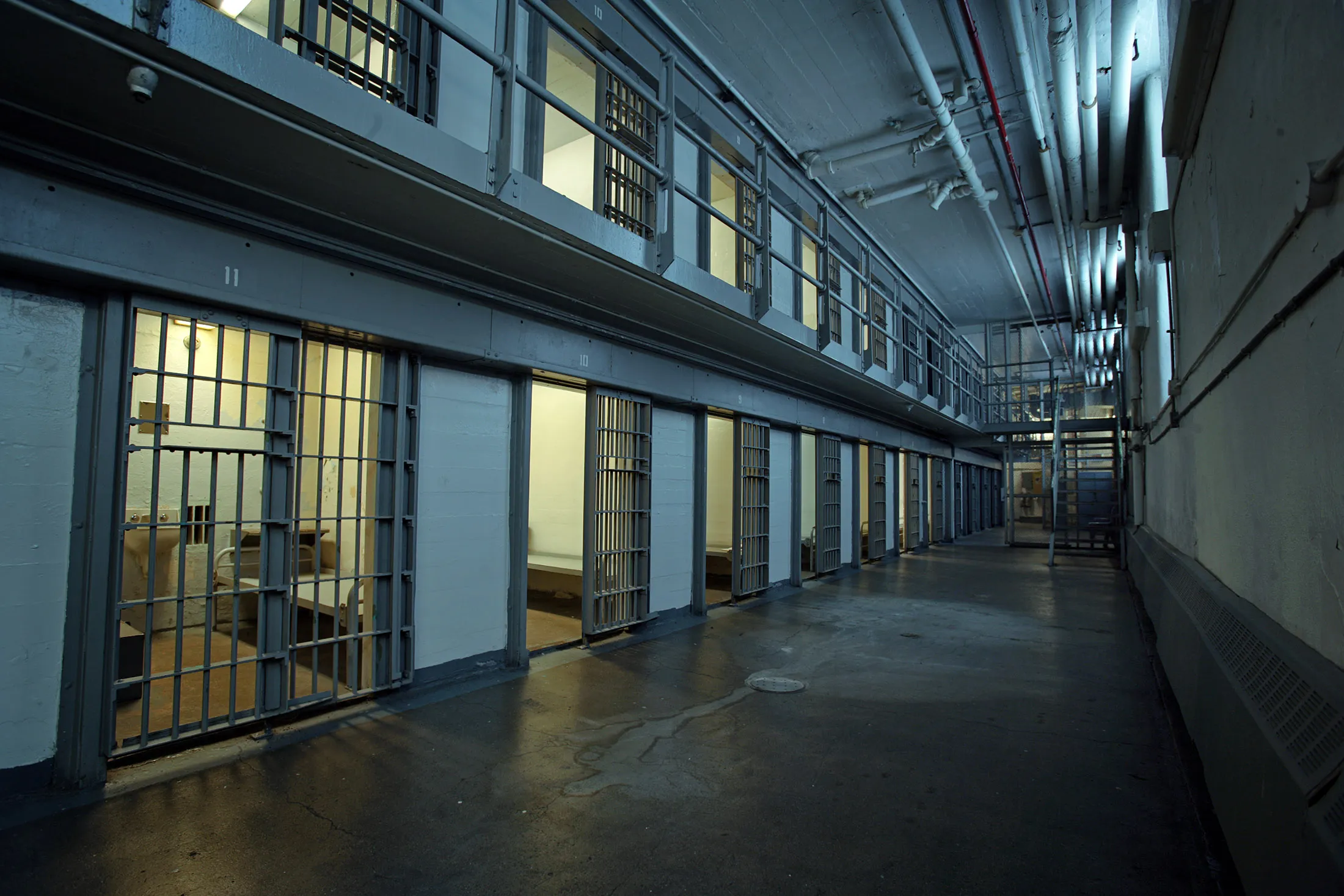 Empty prison hallway.