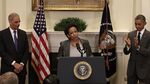 Attorney General nominess Loretta Lynch (C) speaks after U.S. President Barack Obama (R) introduced here as his nominee to replace Eric Holder (L) during a ceremony in the Roosevelt Room of the White House November 8, 2014 in Washington, DC.
