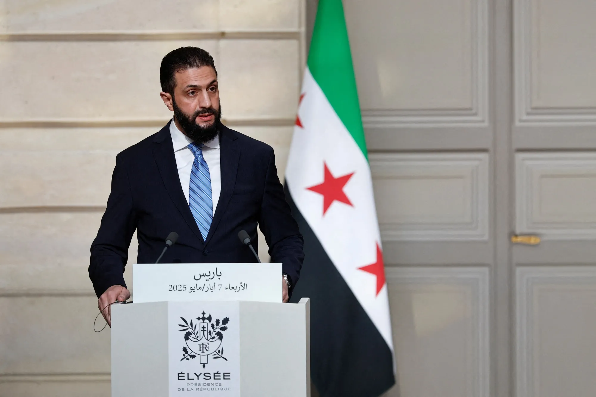 Ahmed al-Sharaa speaks during a press conference after a meeting with French President at the Elysee Palace in Paris, on May 7.