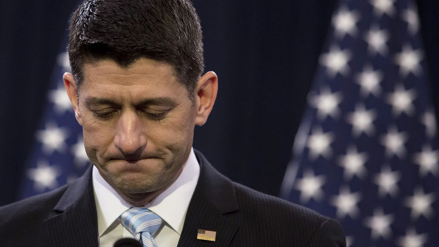 House Speaker Paul Ryan pauses while speaking at the Capitol in Washington on March 23, 2016.
