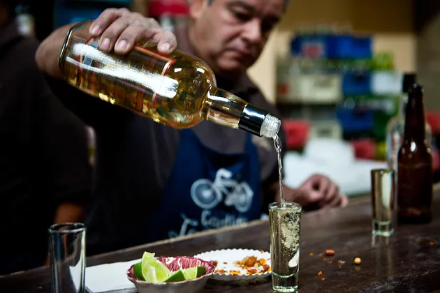 In Guadalajara’s old city, a bartender at Cantina La Fuente, one of the tequila region’s oldest drinking establishments, pours a shot of 100 percent agave tequila