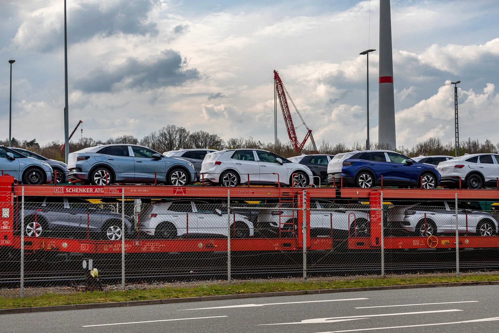 Newly-manufactured electric vehicles&nbsp;on a freight train at the Volkswagen AG plant in Zwickau, Germany.