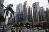 Buildings stand in the central business district in Singapore, on Thursday, Jan. 24, 2019. Rising interest rates and the latest round of property curbshave put the brakes on mortgage demand at Singapore’s banks, potentially further dragging down the city’s housing market.