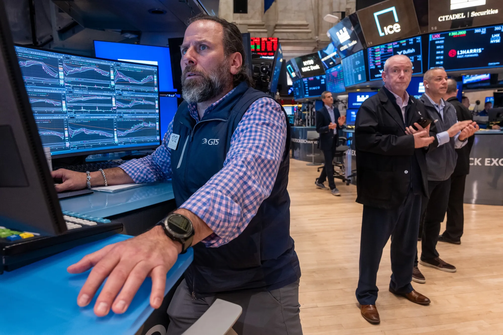 Traders work on the floor of the New York Stock Exchange (NYSE) in New York on March 5.