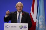 Boris Johnson speaks during a news conference at the COP26 climate talks in Glasgow, U.K., on&nbsp;Nov. 10.&nbsp;