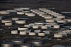 Oil Extends Slide on Strong Dollar as Market Volatility Climbs