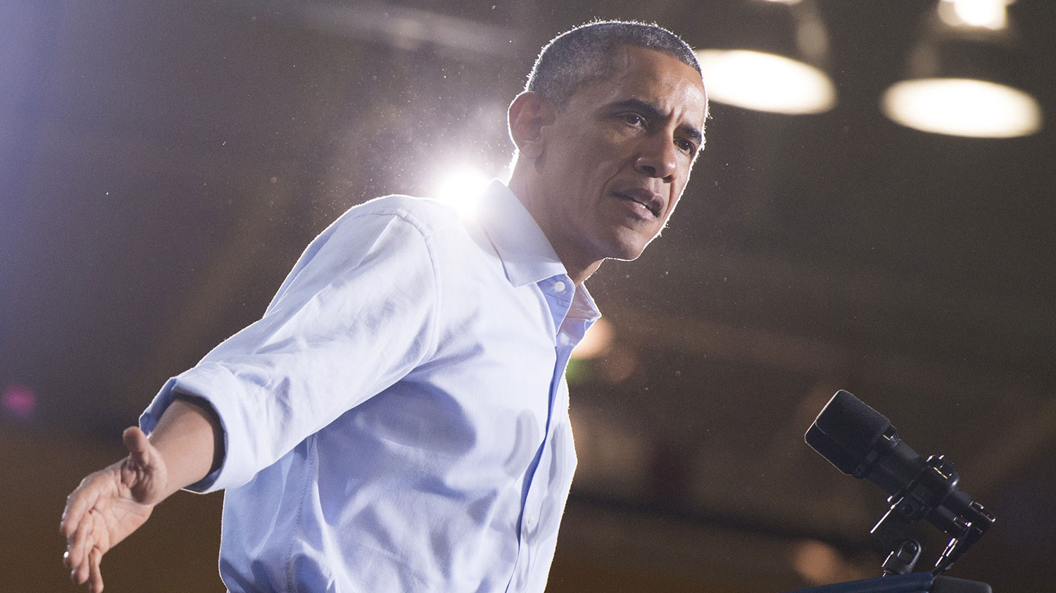 US President Barack Obama speaks at a Democratic campaign rally for US Senate candidate Gary Peters and candidate for Michigan Governor Mark Schauer at the Matthaei Center at Wayne State University in Detroit, Michigan, November 1, 2014.
