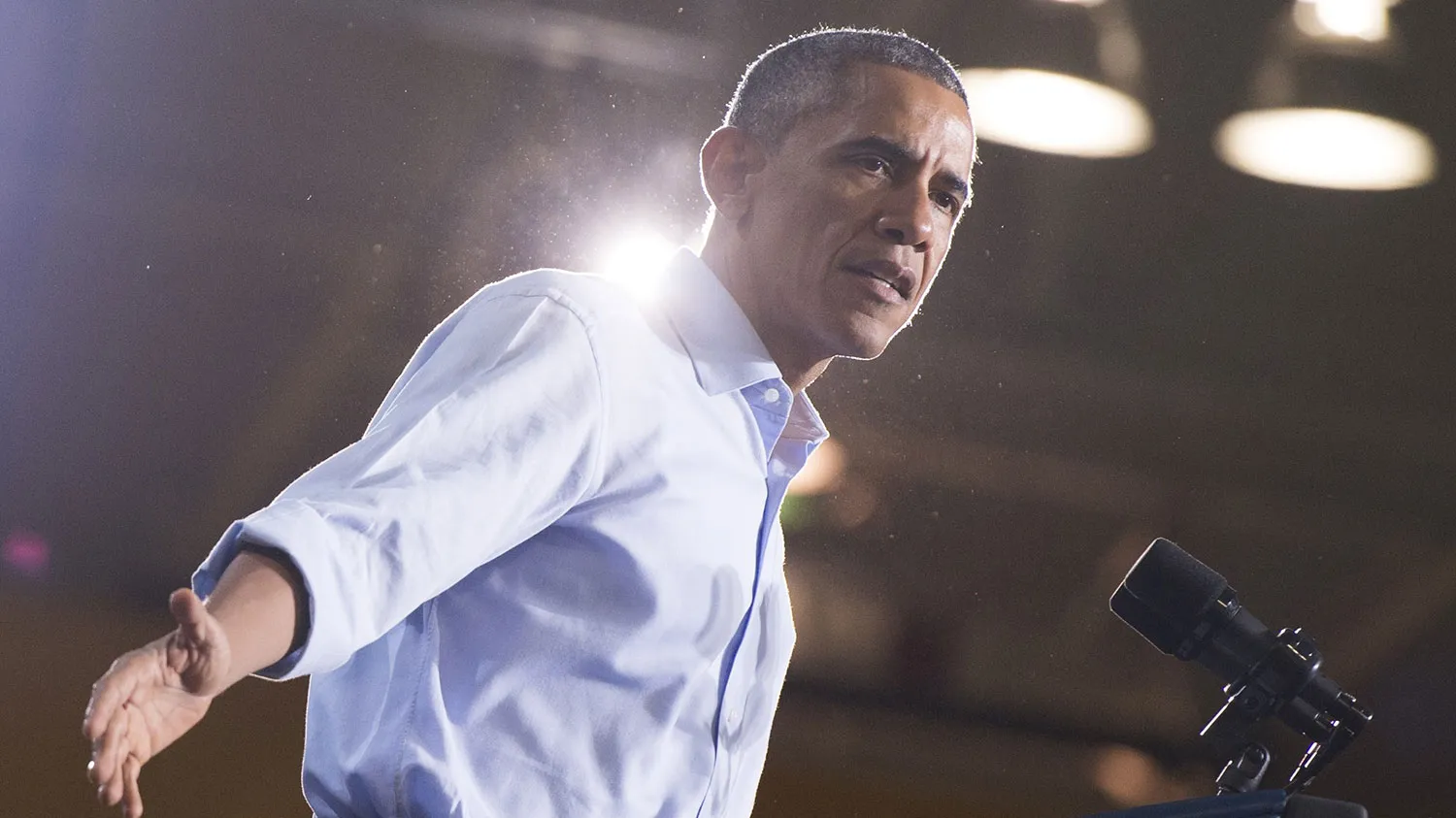 US President Barack Obama speaks at a Democratic campaign rally for US Senate candidate Gary Peters and candidate for Michigan Governor Mark Schauer at the Matthaei Center at Wayne State University in Detroit, Michigan, November 1, 2014.
