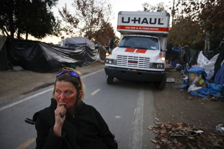 A woman at a homeless encampment in Anaheim, California 