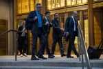 Anton Peraire-Bueno, third from left, and his legal team depart federal court in New York on Oct. 14.