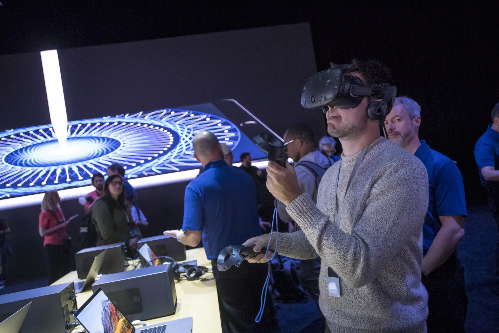 An attendee wears a HTC Vive virtual reality headset during the Apple WWDC Conference in&nbsp;2017.