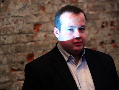 Georgy Alburov at a press conference in Moscow on March 26. 2013.