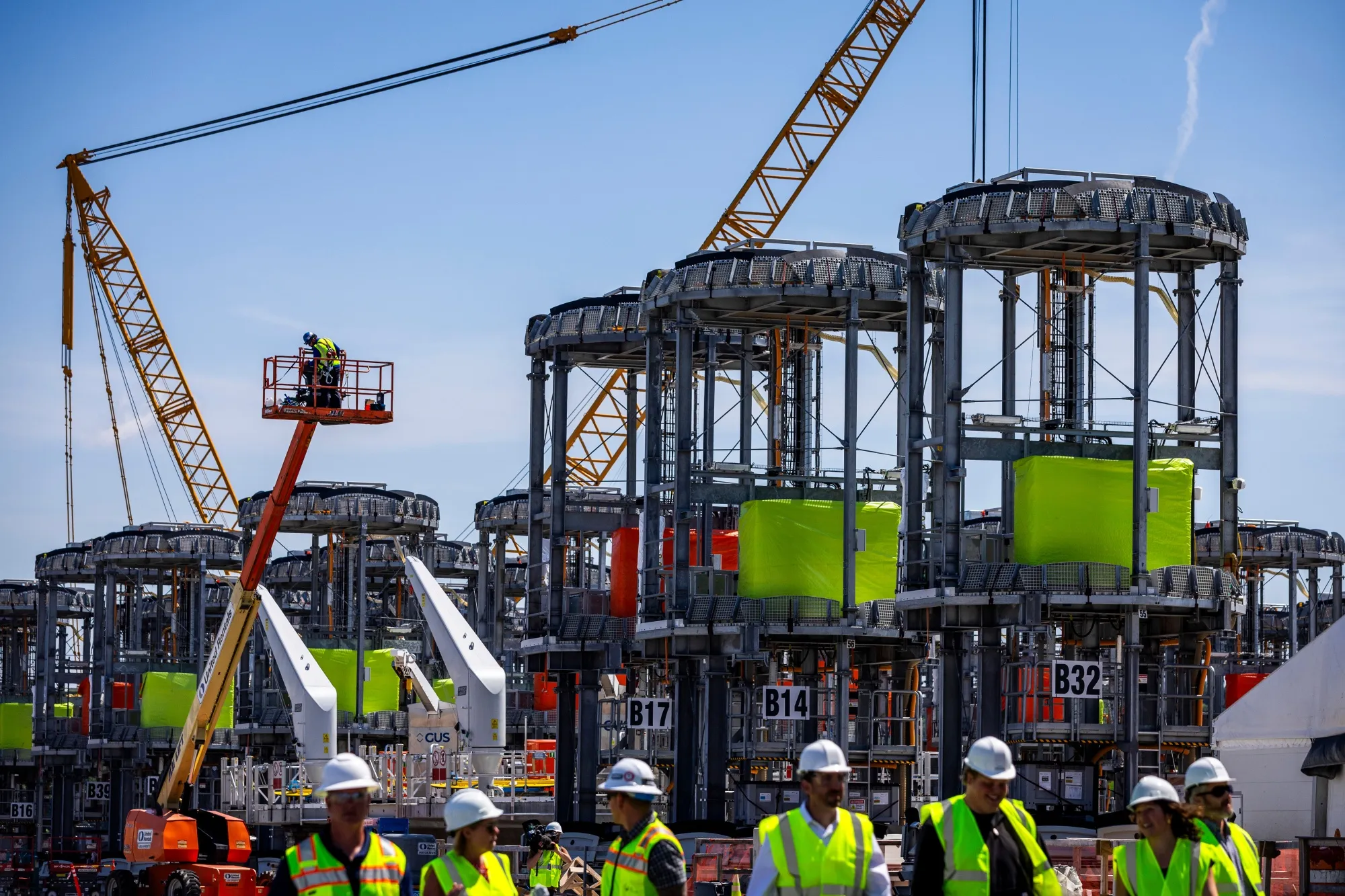 Wind turbine foundation components at the Revolution Wind construction hub at the Port of Providence in Rhode Island.