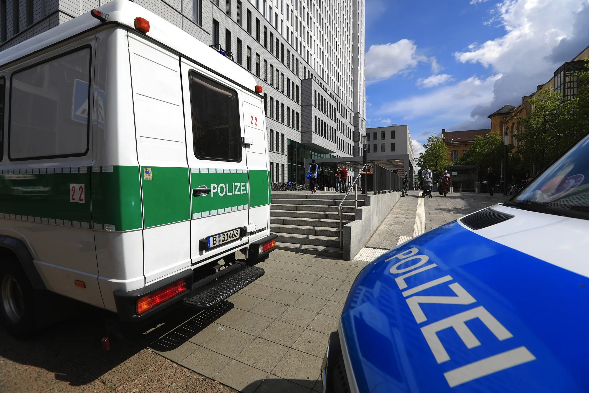 Police vehicles outside Charite Hospital where Alexei Navalny is being treated, in Berlin, on Aug. 24.&nbsp;