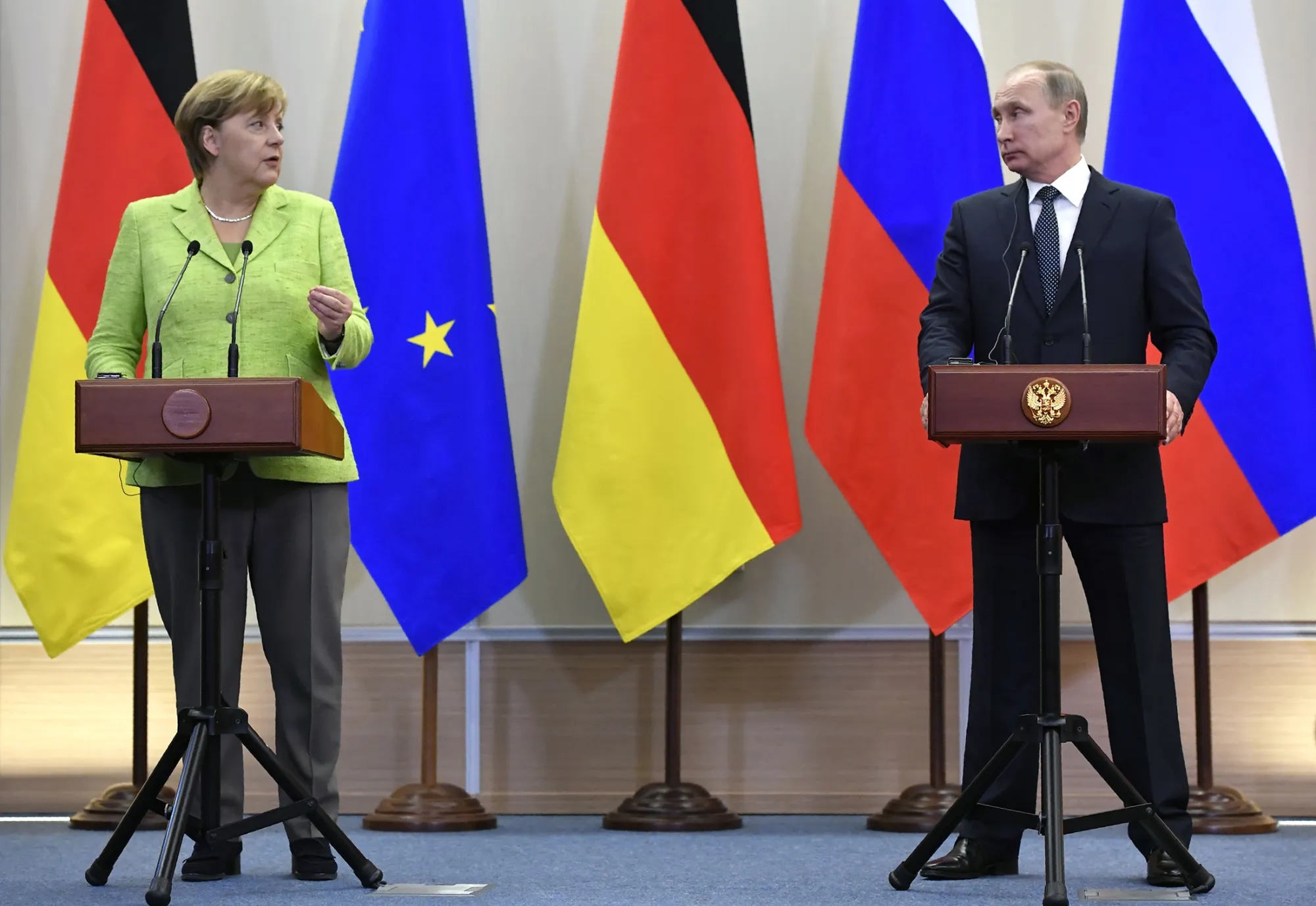 Vladimir Putin and Angela Merkel give a press conference following their meeting at the Bocharov Ruchei state residence in Sochi, Russia, on May 2, 2017.
