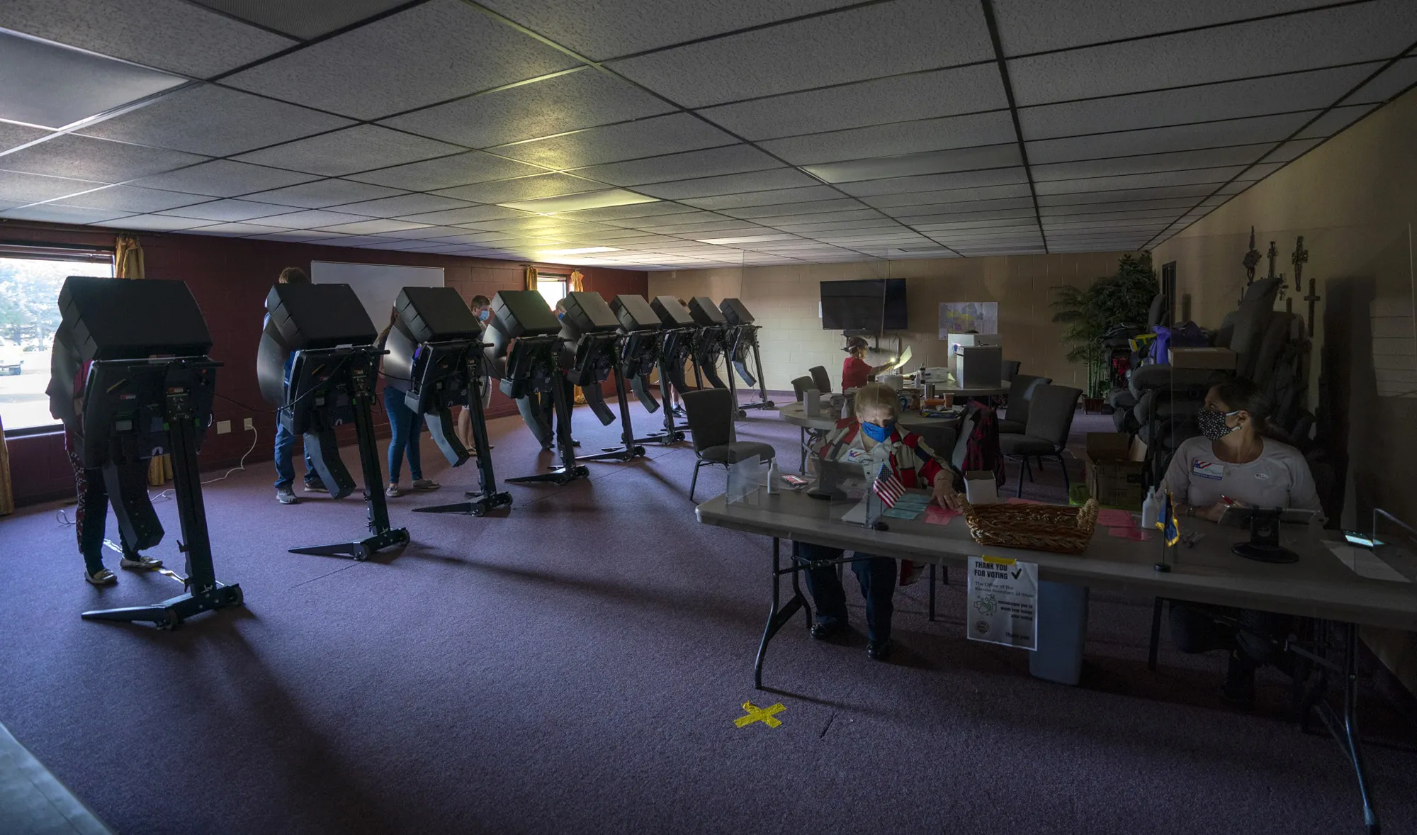 Voters cast ballots at a polling station during a power outage in Manhattan, Kansas, on&nbsp;Aug. 4.&nbsp;