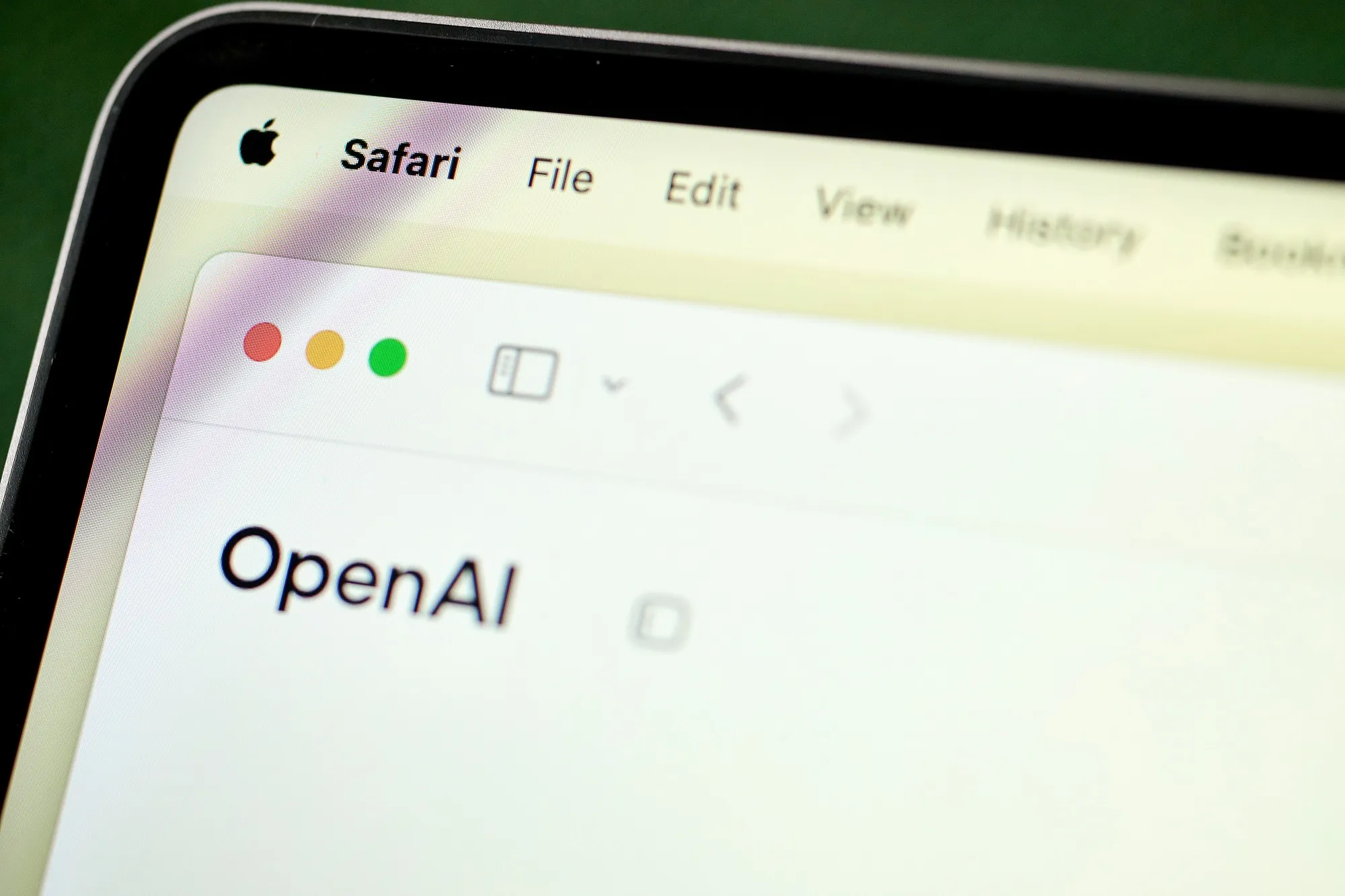 OpenAI on the Apple Safari app on a laptop.
