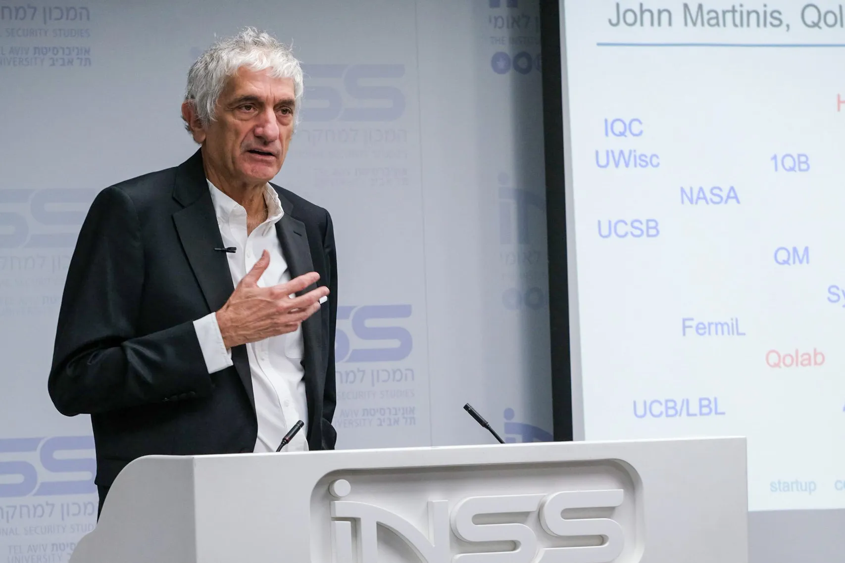 John Martinis speaking in Tel Aviv on Dec. 2.