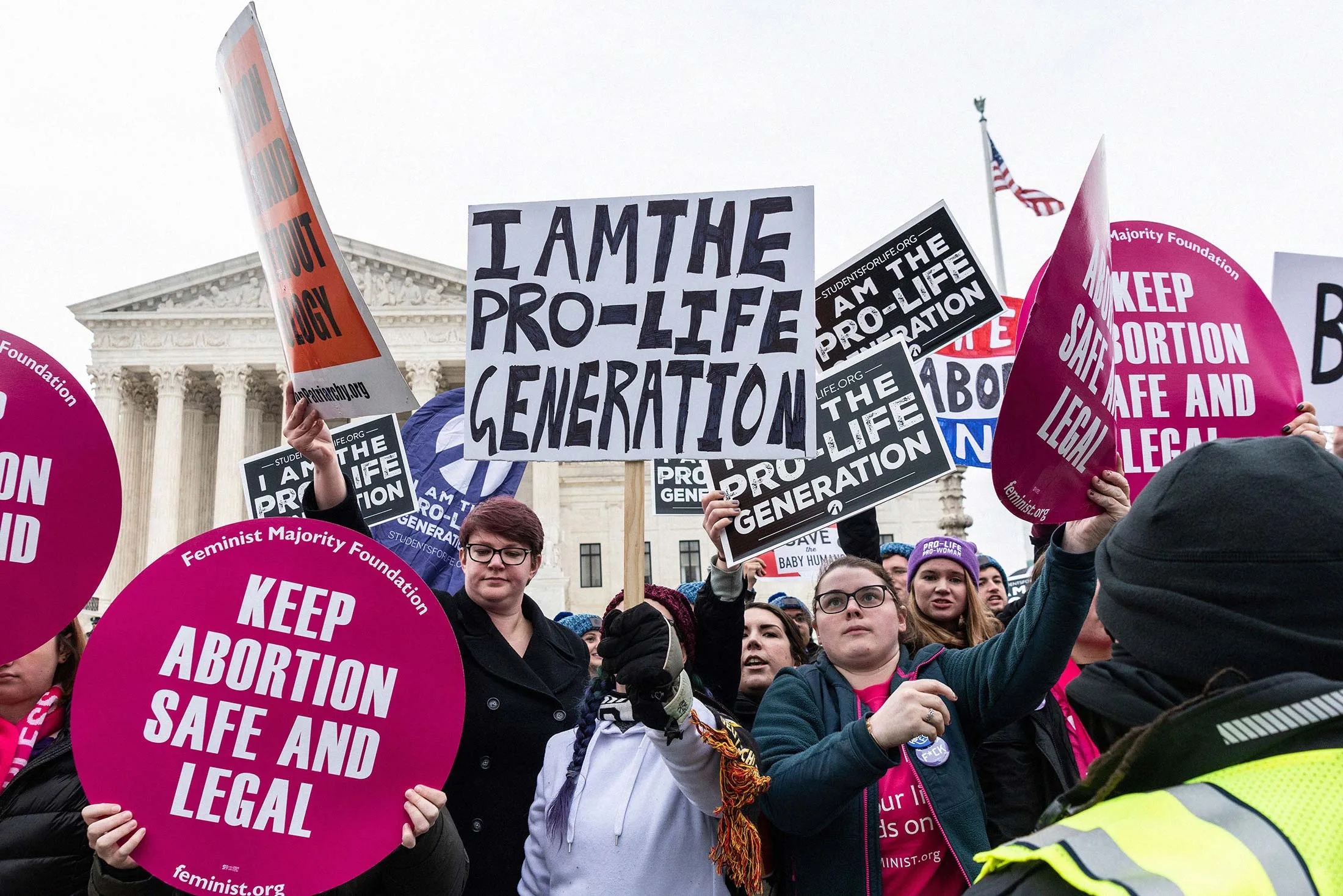 Pro-life and pro-choice supporters gather outside the U.S. Supreme Court as demonstrators march against Roe v. Wade&nbsp;in Washington on Jan. 24.